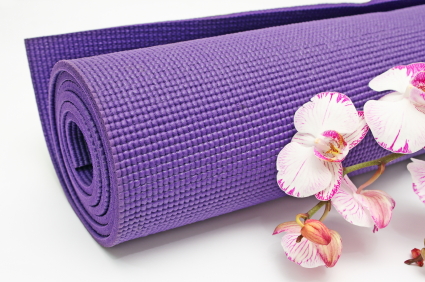 yoga mat and flowers
